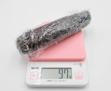 髪の毛を計りにのせる